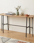 60" Brown and Black Solid Wood and Metal Trestle Console Table