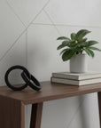 Two Ring Gray Hammered Metal Sculpture