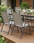 Set of Four 35" Brown Steel Sling Outdoor Folding Arm Chairs