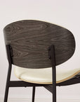 Set of Two Off White and Black Upholstered Faux Leather Curved Back Dining Side Chairs