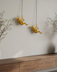 Set of Two Gold Resin Climbing Man Hanging Dimensional Sculpture