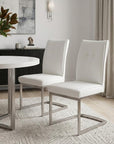 Set of Two Gray And Silver Tufted Faux Leather And Stainless Steel Dining Side Chairs