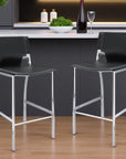 Set of Two 29" Gray And Silver Faux Leather And Metal Low Back Bar Height Bar Chairs
