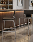 Set of Two 29" Gray And Silver Faux Leather And Metal Low Back Bar Height Bar Chairs