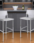 Set of Two 29" White And Silver Faux Leather And Metal Low Back Bar Height Bar Chairs