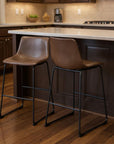 Set of Two 29" Espresso And Black Faux Leather And Steel Counter Height Bar Chairs