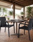 Set of Two Black Faux Rattan Heavy Duty Plastic Outdoor Stacking Arm Chairs