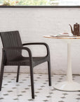 Set of Two Black Faux Rattan Heavy Duty Plastic Outdoor Stacking Arm Chairs