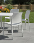 Set of Four Blue Heavy Duty Plastic Outdoor Stacking Dining Chairs