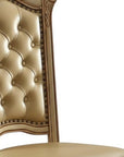 Set of Two Tufted Bone and Brass Upholstered Faux Leather And Wood Dining Side Chairs