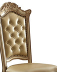 Set of Two Tufted Bone and Brass Upholstered Faux Leather And Wood Dining Side Chairs