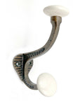Set of Six Bronze And White Cast Iron And Ceramic Double Wall Hooks