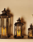 Set of Three Black And Gold Distressed Filigree Metal Tabletop Lantern Candle Holders