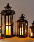 Set of Three Black And Gold Distressed Filigree Metal Tabletop Lantern Candle Holders