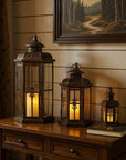 Set of Three Black And Gold Distressed Filigree Metal Tabletop Lantern Candle Holders