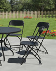 Set of Four White Metal Outdoor Folding Stacking Dining Chairs