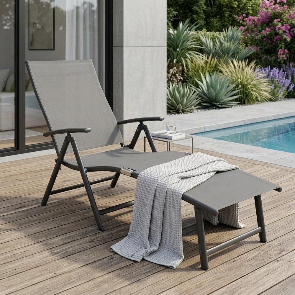 45" Tan Aluminum Eight Position Adjustable Sling Outdoor Folding Chaise Lounge