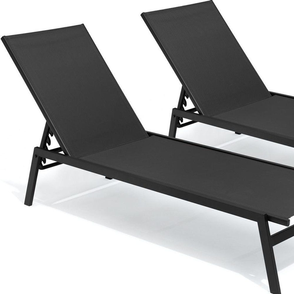Set of Two Black Steel Five Position Adjustable Outdoor Stacking Chaise Lounges