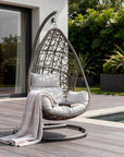 40" Dark Gray Aluminum Outdoor Rocking Egg Chair with White Cushion
