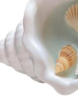 6" Light Blue Sea Salt And Orchid Scented Candle In White Resin Novelty Holder With Shells