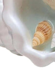 6" Light Blue Sea Salt And Orchid Scented Candle In White Resin Novelty Holder With Shells