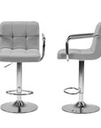 Set of Two Black And Silver Faux Leather And Aluminum Adjustable Height Swivel Bar Chairs